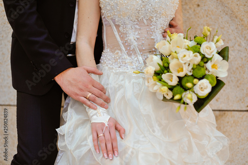 wedding bouquet. Wedding couple holding hands