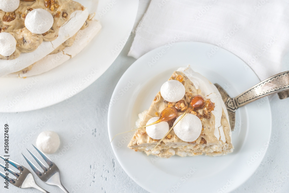 Pavlova cake with caramel and almonds Pavlova cake with caramel and almonds