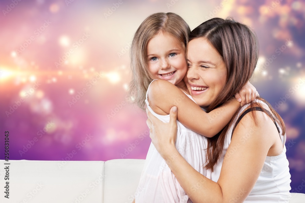 Happy Mother and daughter hugging Happy Mother and daughter hugging
