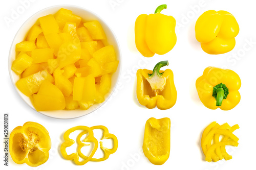 Set of fresh whole and sliced yellow bell pepper isolated on white background. Top view