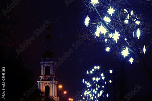 Fairy tale of Christmas night at moment when it snowed photo