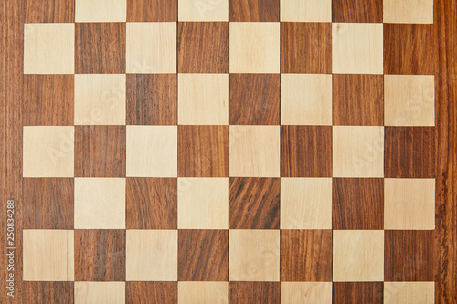 top view of empty wooden chess board
