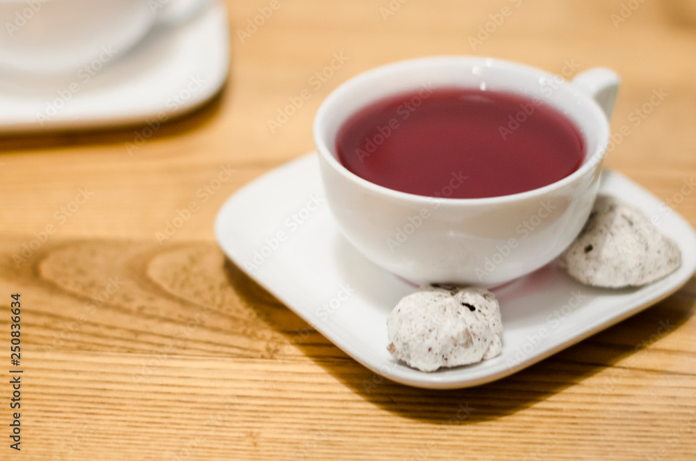 A white cup of fruit tea A white cup of fruit tea