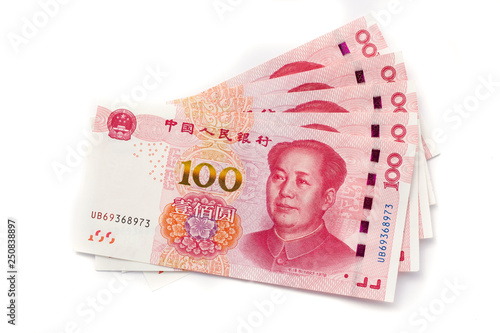 Hundred Chinese Yuan banknotes on white background, paper money, Bank of China, Financial system of China photo