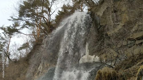 waterfall in the forest in winter