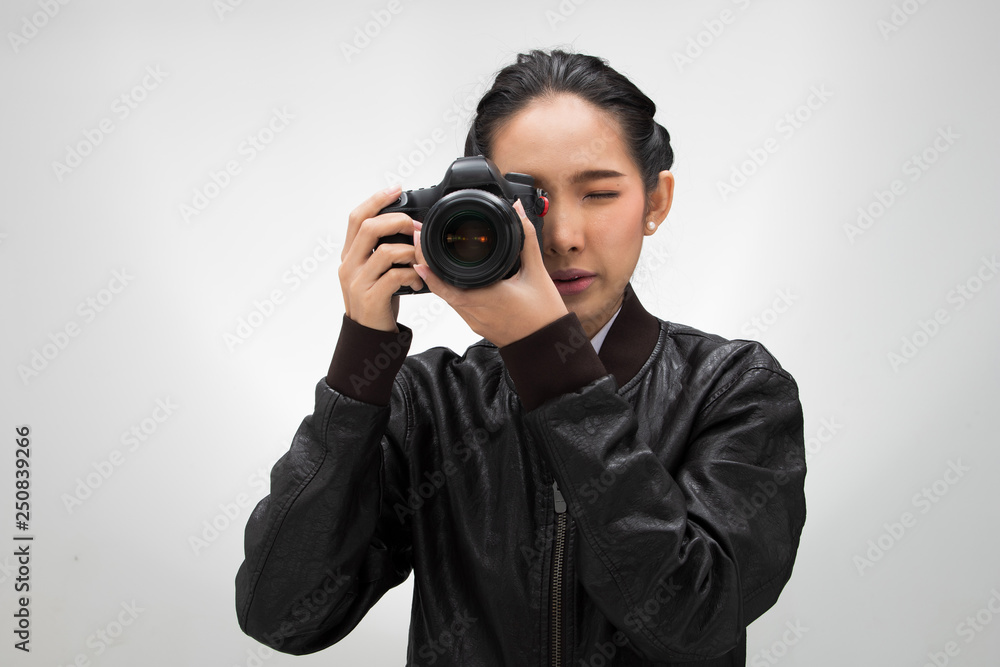 Photographer hold camera with lens point to shoot subject, wear normal dark black leater suit jacket. studio lighting white gradient grey background isolated, reporter journalist take photo celebrity Photographer hold camera with lens point to shoot subject, wear normal dark black leater suit jacket. studio lighting white gradient grey background isolated, reporter journalist take photo celebrity