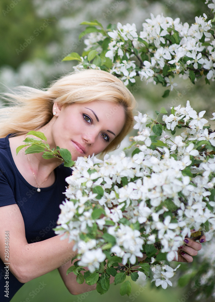 Beautiful girl on the background of spring bush Beautiful girl on the background of spring bush