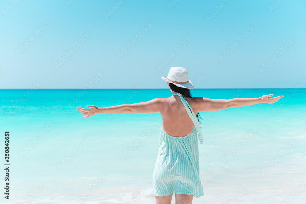 Young beautiful woman on beach vacation on Caribs Young beautiful woman on beach vacation on Caribs