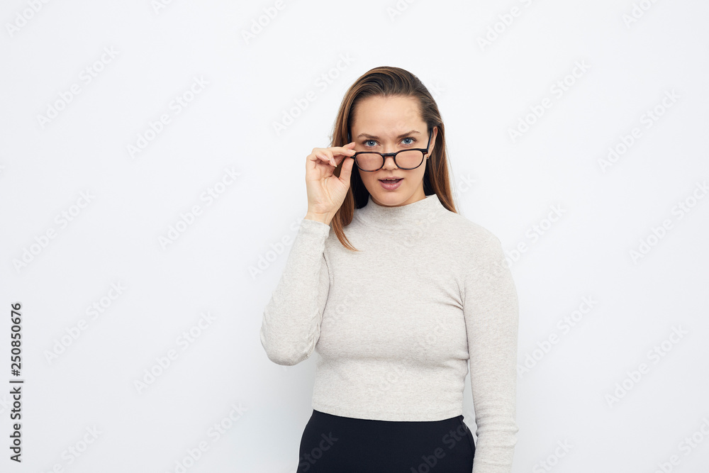 portrait of young seriously woman looking clever and determined portrait of young seriously woman looking clever and determined
