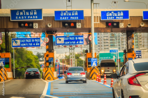 Extra blue easy pass lane to paying the easy pass tolls fee at the automated tollbooth that faster and easier than the normal cash payment lane. photo