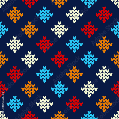 Seamless knitted pattern. A warm sweater. Knitted rectangles. Can be used for wallpaper, textile, invitation card, wrapping, web page background.