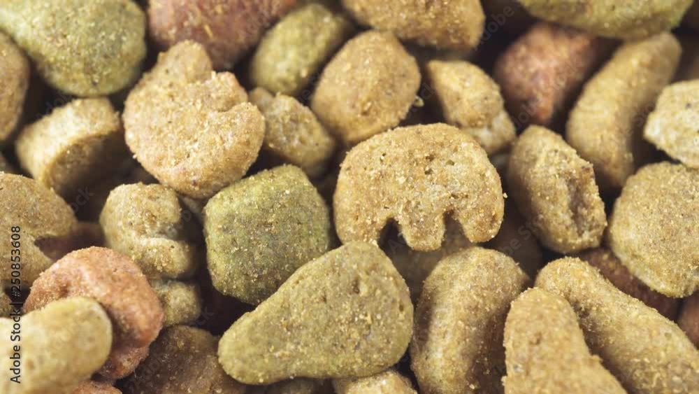 A lot of dry food for dogs and cats, slow motion
