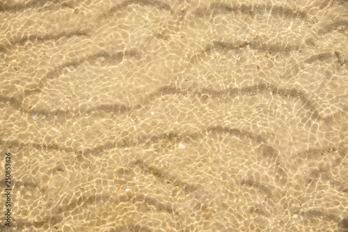 Sand under sea water