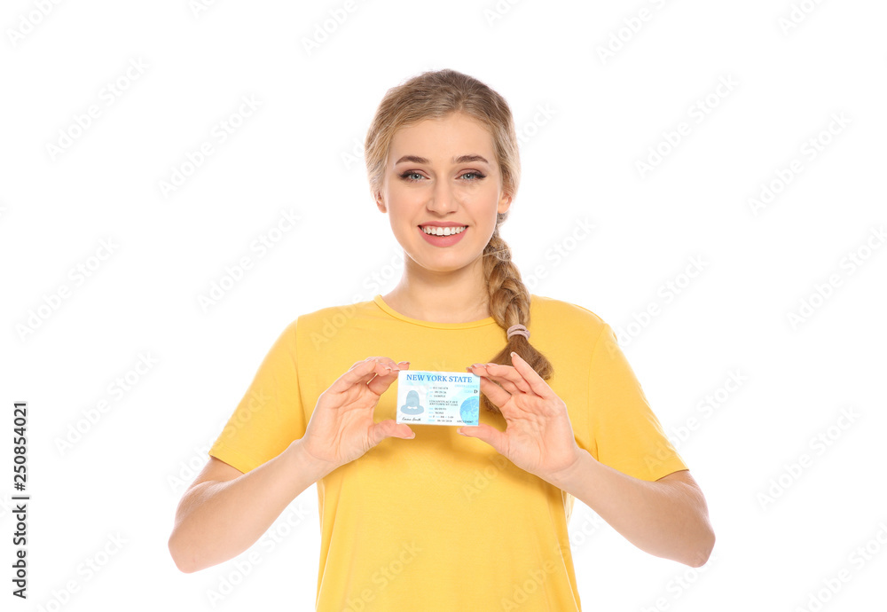 Happy young woman with driving license on white background Happy young woman with driving license on white background
