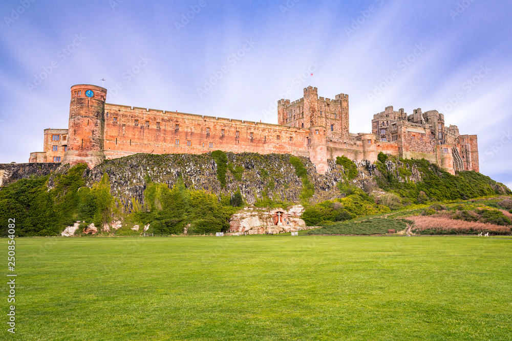 Bamburgh Castle is on the northeast coast of England, by the village of Bamburgh in Northumberland.