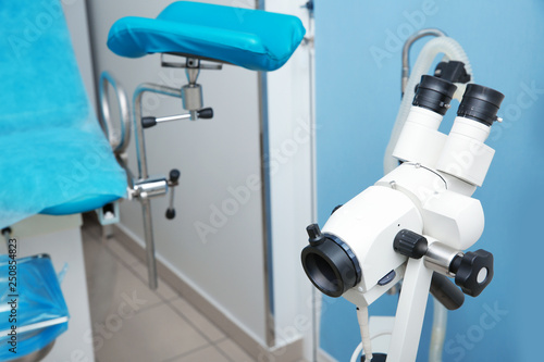Modern binocular colposcope in gynecological clinic, closeup