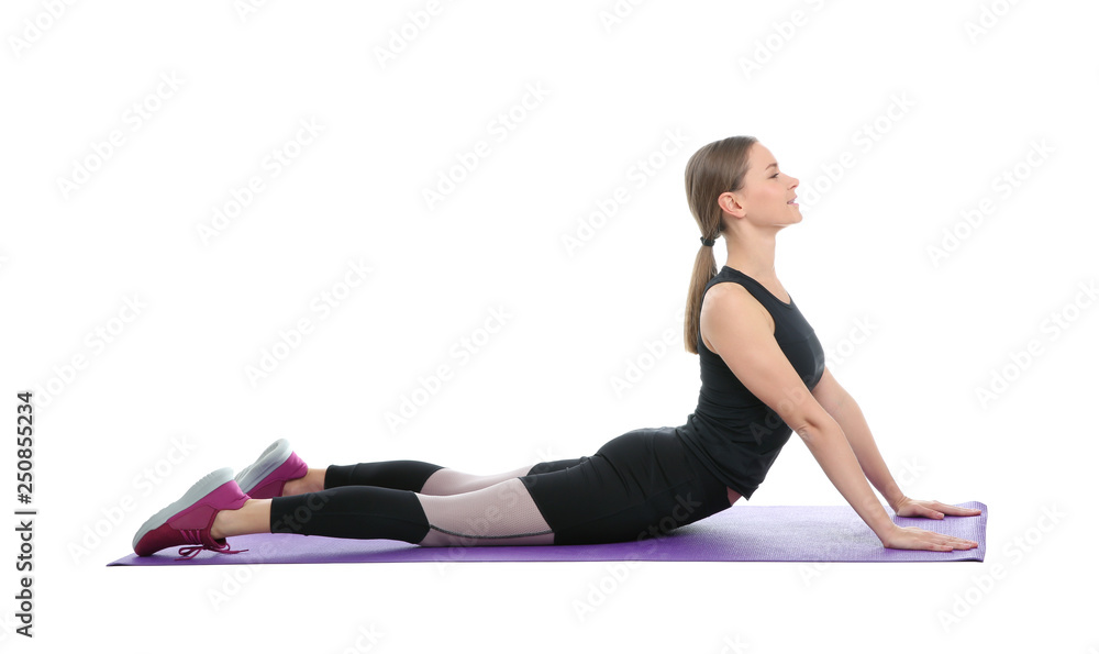 Young woman doing sports exercises isolated on white. Home fitness Young woman doing sports exercises isolated on white. Home fitness