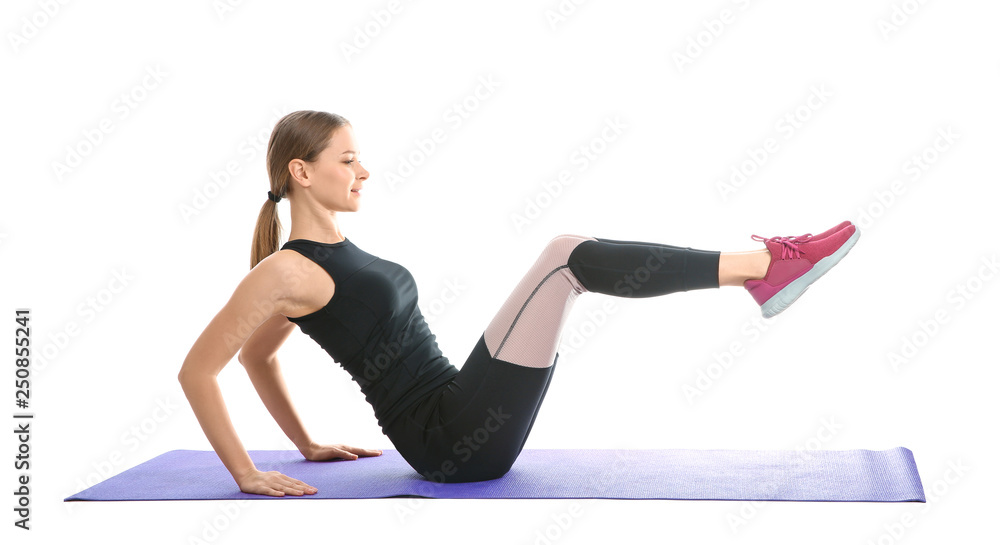 Young woman doing sports exercises isolated on white. Home fitness Young woman doing sports exercises isolated on white. Home fitness