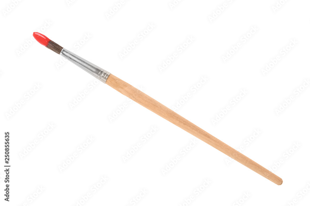 Brush with color paint on white background, top view Brush with color paint on white background, top view