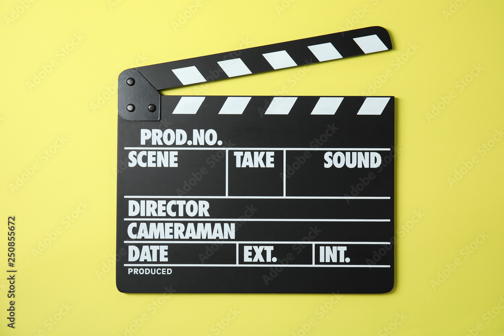 Clapperboard on color background, top view. Cinema production