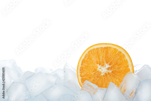 Fresh orange on ice cubes against white background