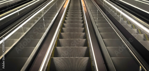 Fototapeta Naklejka Na Ścianę i Meble -  Cutout of multiple escalators