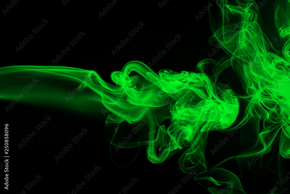Green Smoke abstract on black background, darkness concept