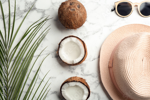 Flat lay composition with coconuts on marble background
