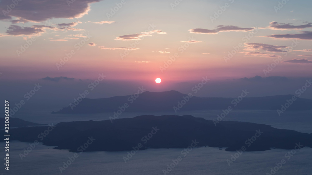 Sunset on the Nea Kameni vulcano - obrazy, fototapety, plakaty 