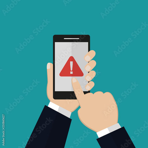 Warning sign on smartphone screen.Hand holds the smartphone and finger touches screen. Flat design
