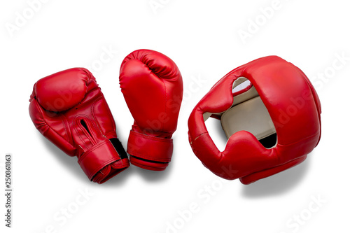 Two red Boxing gloves and a protective Boxing helmet isolate on a white background