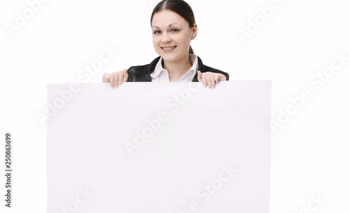 young woman employee of the company holding a blank banner