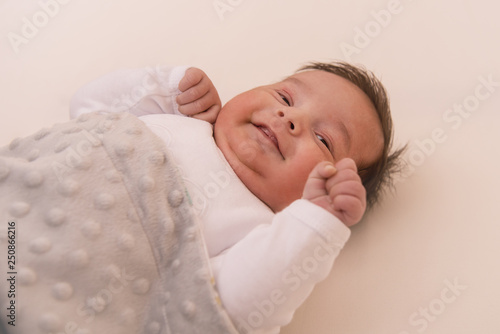 cute happy newborn baby boy  photo