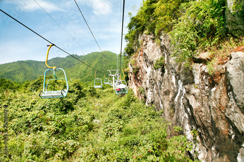 Long half empty cable car at Yaoshan Mountain. Guilin, China.