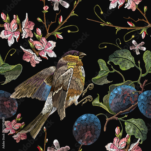 Embroidery birds, blossoming cherry and grapes seamless pattern. Spring fashion pattern, template for design of clothes, t-shirt design
