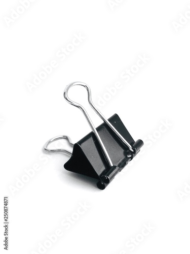 Clip for paper black on a white background - a device for binding paper sheets