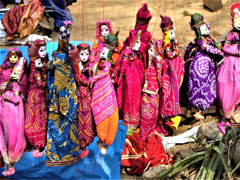 multicolour group of indian puppets at craft fair, india