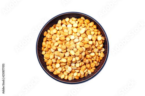 Split Chickpea Also Know as Chana Dal, Dried Chickpea Lentils or Toor Dal, Heap of yellow split chickpeas, Raw lentil, Pakistani/Indian beans isolated on white Background