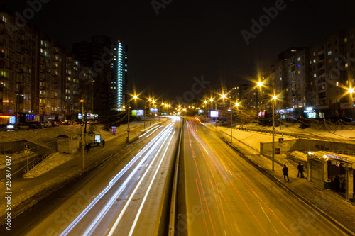 night city cars road lights architecture evening headlights 