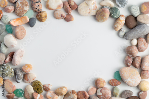 Textural abstract background of sea pebbles.