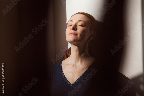 Portrait of woman with eyes closed  photo