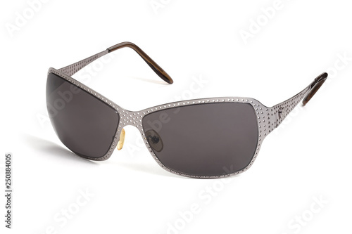 Stylish unisex sunglasses on a white background. In a half turn.