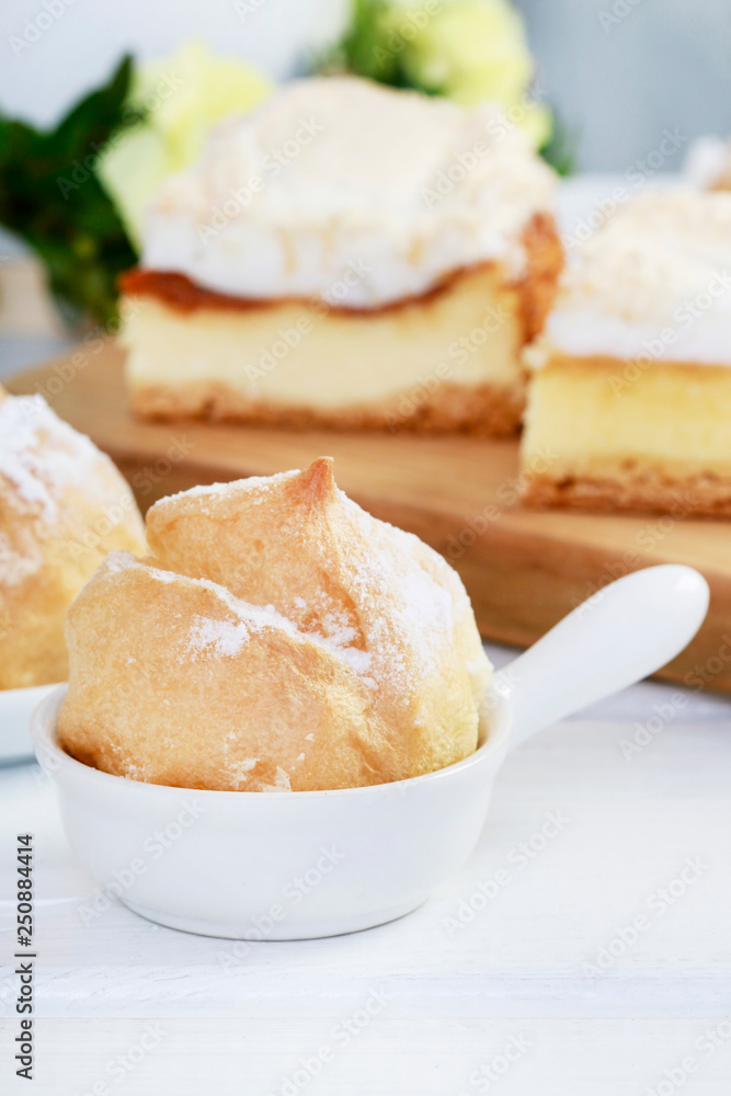 Eclair cakes filled with vanilla cream and traditional cheese cake. Eclair cakes filled with vanilla cream and traditional cheese cake.