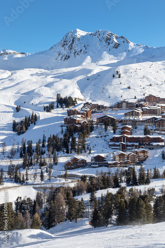 Scenic view of a high altitude ski resort Belle Plagne in French Savoy Alps on a beautiful sunny day.