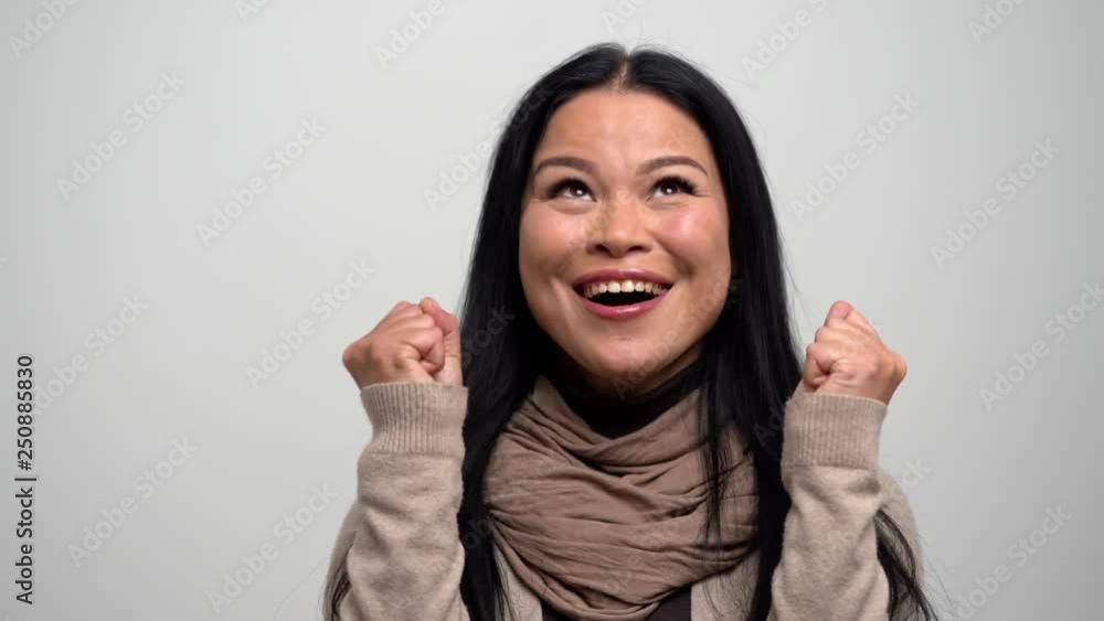 Happy Brunette Woman with Narrow Eyes Sincerely Rejoices. Happy Brunette Woman with Narrow Eyes Sincerely Rejoices.