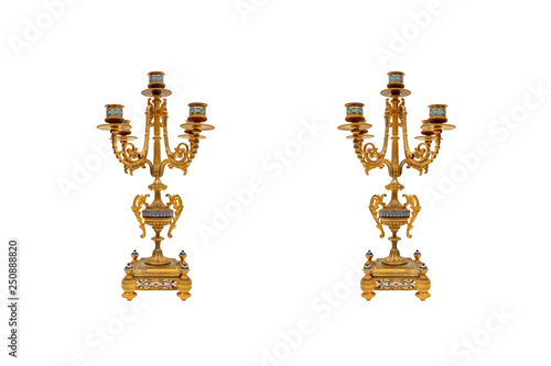 Antique Paired Bronze Candelabra.On a white background.