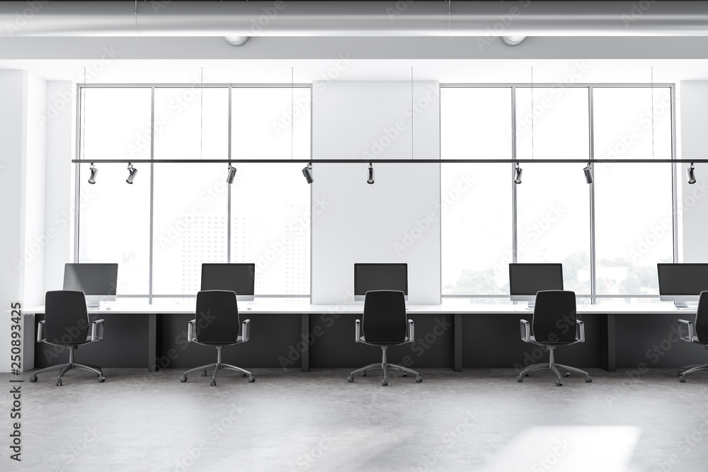 Row of tables in industrial style office Row of tables in industrial style office