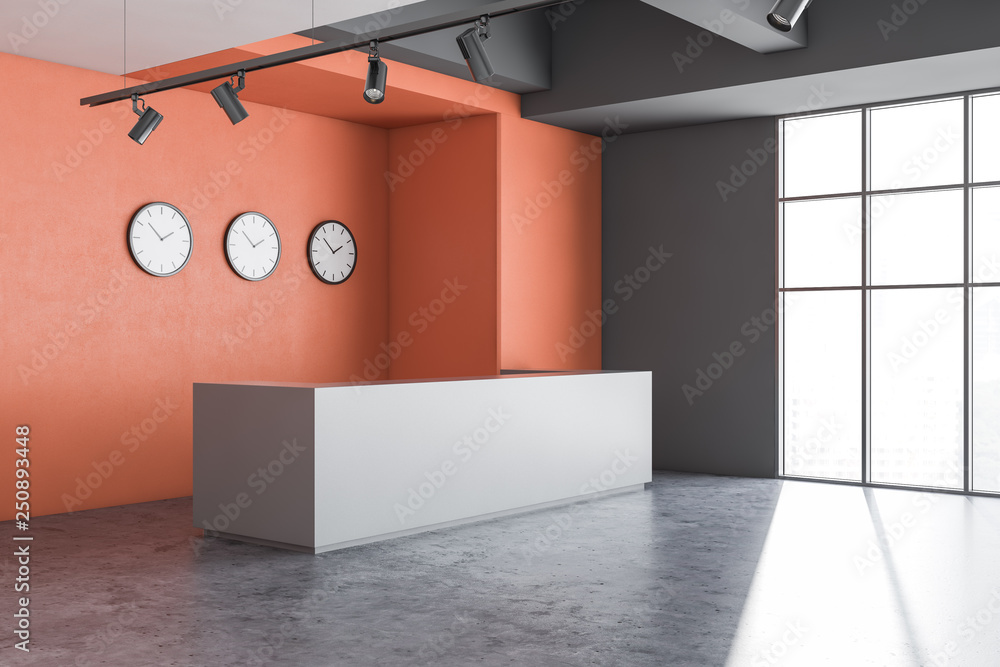 Corner of orange office with reception Corner of orange office with reception