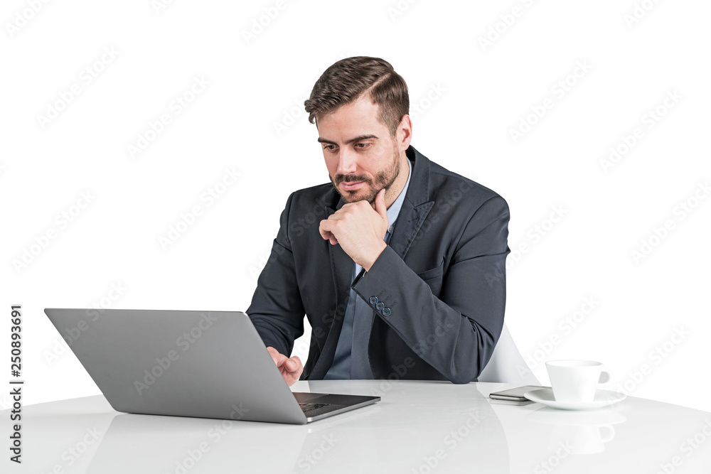 Serious businessman working with laptop, isolated Serious businessman working with laptop, isolated