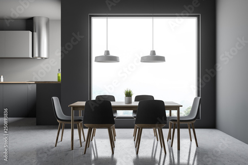 Gray kitchen interior with big window and table